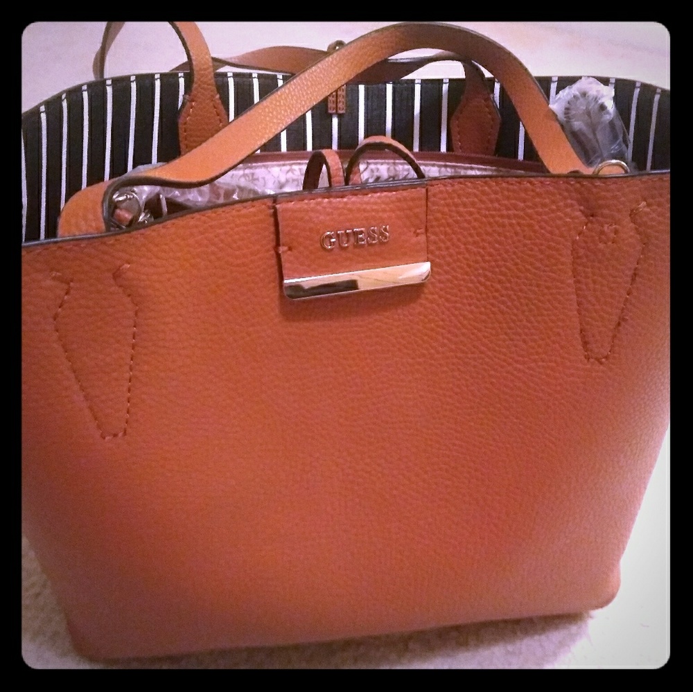 GUESS Versatile purse brown or zebra stripes
